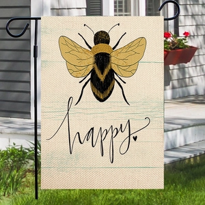 Summer Bee Happy garden flag with black metal L-bracket stand on a green lawn background