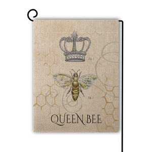 Detailed texture of rustic burlap garden flag with vintage queen bee print and hanger