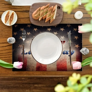 Linen placemat with American flag design and Labor Day text on a wooden table