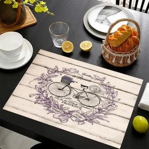 Set de table vintage en lin avec motif lavande et vélo sur table en bois noir