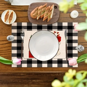 Linen Christmas placemat with festive dwarf illustration and black-white checkered border