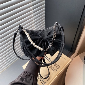 Elegante borsa a tracolla con fiocco nero, catena di perle e tessuto testurizzato