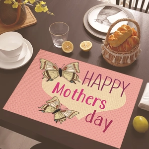 Detailed view of Happy Mother's Day linen placemat with heart and butterfly print