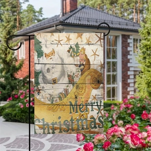 Christmas garden flag with Santa sleigh design on linen hanging in a sunlit villa yard