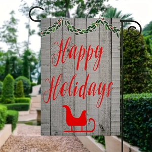 Double-sided linen garden flag with Happy Holidays text and sled on a metal stand