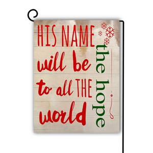 Detail of double-sided linen garden flag with festive text and metal bracket stand