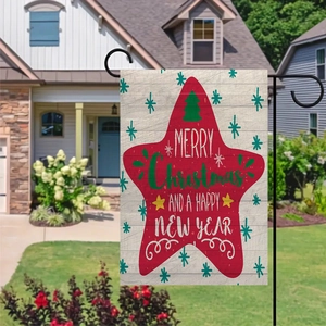Detailed view of Merry Christmas double-sided garden flag in a scenic yard