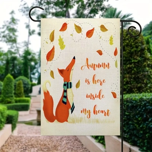 Double-sided linen garden flag with fox and autumn leaves hanging on a black yard hook