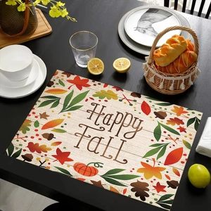 Detalle del mantel individual de lino Happy Fall con hojas de otoño y calabaza festiva