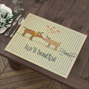 Linen placemat with 'Life is Beautiful' print and dog illustration on wooden table