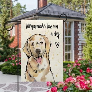 Golden Retriever garden flag with All you need is love text in a blooming yard