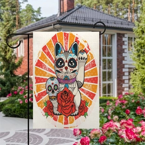 Detailed view of Day of the Dead linen garden flag with skull cat design in backyard