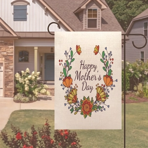 Outdoor garden flag detail showing double-sided linen texture and floral wreath design