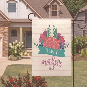 Close-up of Mother's Day garden flag with floral design and metal L-shaped stand on a lawn
