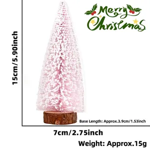Mini albero di Natale rosa floccato da 15 cm di altezza con dimensioni della base in legno