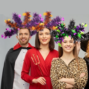 Models wearing Halloween headbands with colorful tinsel pumpkins and bat motifs