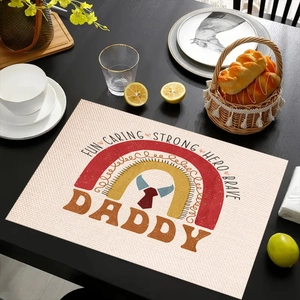 Close-up of linen Father's Day placemat with Daddy hero text and tie design