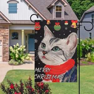 Detailed Christmas garden flag featuring a festive cat on linen fabric hanging outdoors