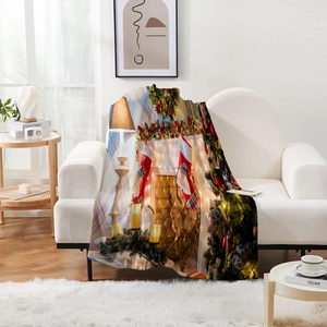 Thick flannel Christmas blanket with digital print fireplace design on white sofa