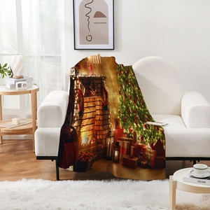 Detail of soft flannel blanket with festive Christmas tree and fireplace digital print