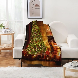 Detail of soft flannel Christmas blanket with festive tree and fireplace digital print