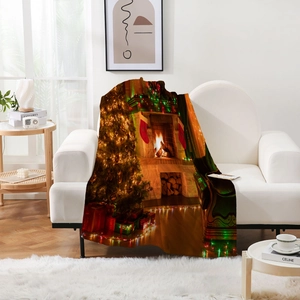 Detail of Christmas tree and fireplace digital print on soft flannel decorative blanket