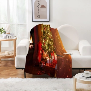 Detail of soft flannel blanket featuring digital printed Christmas tree and fireplace scene