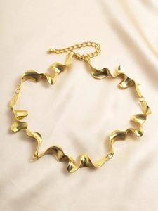 Detailed close-up of high-polish golden liquid lava texture choker with adjustable chain