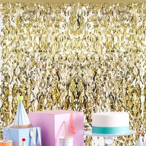 Golden wavy foil fringe curtain backdrop for birthday party celebration decor