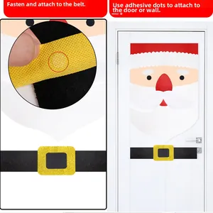 Detail of Christmas felt door stickers showing adhesive dots for easy installation