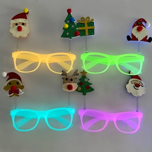 Luminous Christmas party glasses with glowing LED frames and holiday cartoon toppers