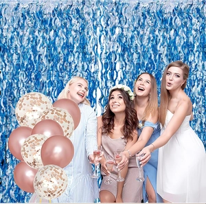 Blue laser tinsel fringe curtain and rose gold confetti balloons for party decor