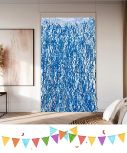 Close-up of shiny blue laser spiral foil curtain for birthday party backdrop decoration