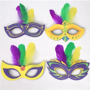 Set of four Mardi Gras masquerade masks with colorful feathers and gold glitter finish