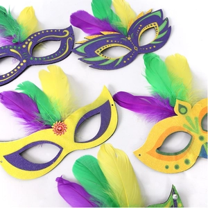 Brazilian carnival masks in purple gold and green with vibrant feathers on white background