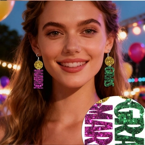 Macro shot of glittery Mardi Gras letter earrings with purple and green sequins
