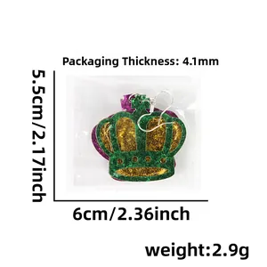 Detail view of carnival crown earring with glitter in purple, gold and green with size labels