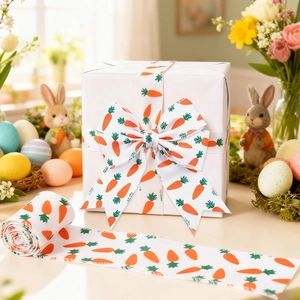 Close-up of Easter ribbon bow with carrot prints and ribbed texture on gift packaging