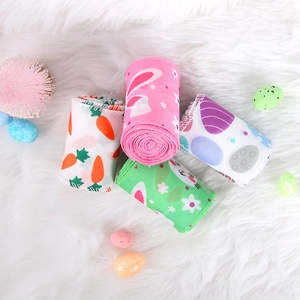 Four-roll Easter ribbon set with rabbit and egg prints for DIY gift wrapping and decor