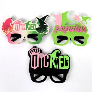 Three Wicked theme party glasses featuring Elphaba and Glinda silhouettes in pink and green