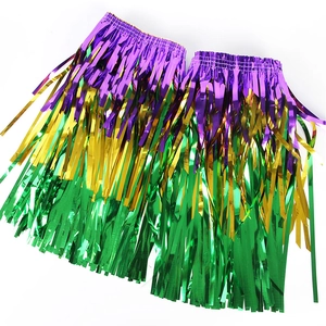 Detail of purple, gold, and green metallic tinsel fringe accessories for Mardi Gras parties