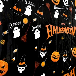 Detail of Halloween PE tablecloth featuring pumpkins, ghosts, and festive prints