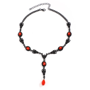 Gothic vampire style necklace with red rubies and black bat accents for Halloween
