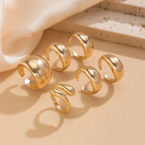 6-piece chunky gold ring set featuring irregular curved surfaces and minimalist designs
