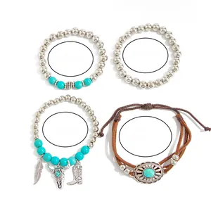 Detail of Bohemian 4-piece bracelet set with turquoise beads and western charms
