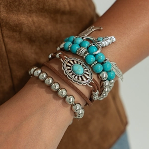 Bohemian multi-layer turquoise bead bracelet set with silver cow and feather charms
