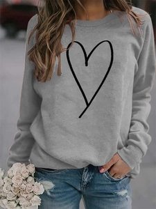 Detail of grey crewneck sweatshirt featuring a black hand-drawn heart line art graphic