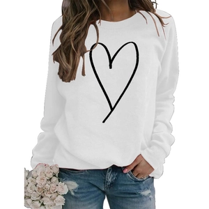 Close-up of minimalist heart line print on white long sleeve sweatshirt for women