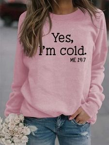 Detail of pink long-sleeve sweatshirt with black Yes I'm cold funny print for women