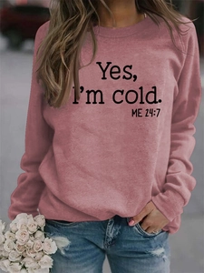 Detail shot of Yes I'm cold graphic print on a pink oversized fleece sweatshirt for women